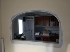 Cocina abierta con arco
